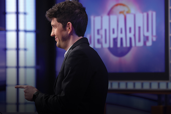 Matt Amodio pointing on the Jeopardy! set